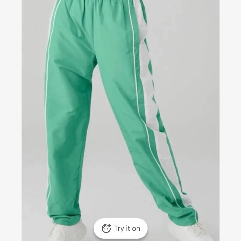 ALO Yoga  Green Joggers with White Stripes